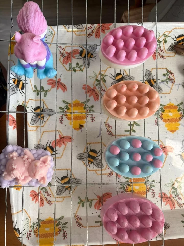 Pink pig soap on a lavender cloud.
